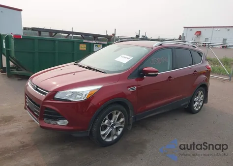 2015 Ford Escape Titanium z USA, uszkodzony, nr VIN 1FMCU9J98FUC26108